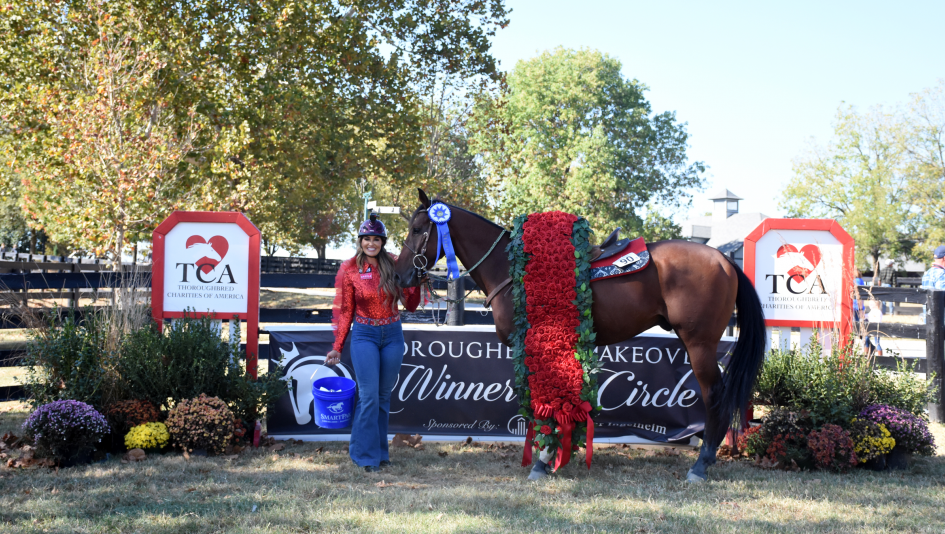Fallon Taylor with 2019 Thoroughbred Makeover Champion Cowboy Swagger. (Melissa Bauer-Herzog/America's Best Racing)