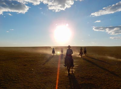 Days sometimes don't end until sunset on the Gobi Gallop Pictured - Ryan Kertanis, Jenna Arnett, Kylie Gracie, Anita McNamara, Head Guide and Co-Owner of Horse Trek Mongolia, Batsaikhan Days sometimes don't end until sunset on the Gobi Gallop Pictured - Ryan Kertanis, Jenna Arnett, Kylie Gracie, Anita McNamara, Head Guide and Co-Owner of Horse Trek Mongolia, Batsaikhan