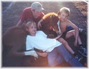 Donna’s niece and nephews with a foal they helped raise