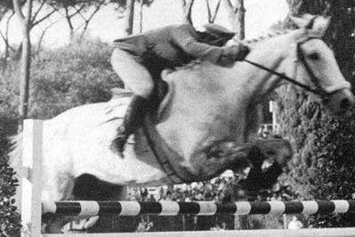 Colonel Piero d’Inzeo with a forward seat on The Rock, silver medal Rome Olympics 1960, photo wiki Italia